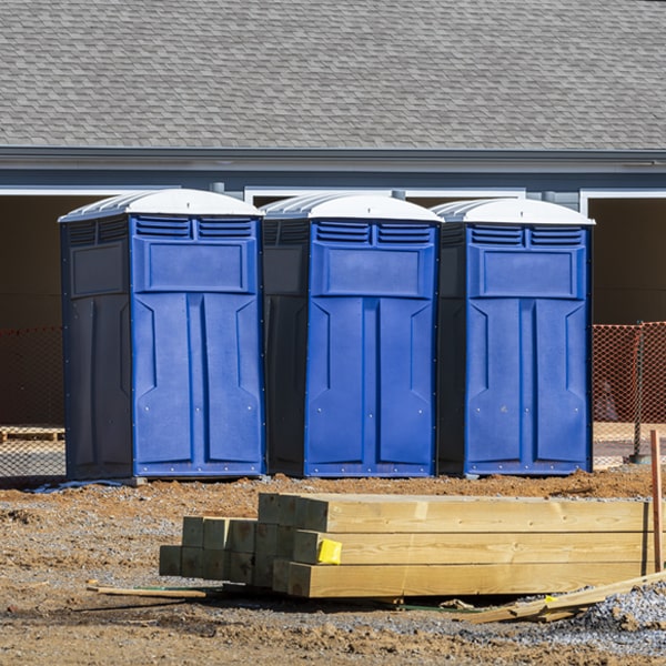 what is the cost difference between standard and deluxe portable restroom rentals in Highwood Montana